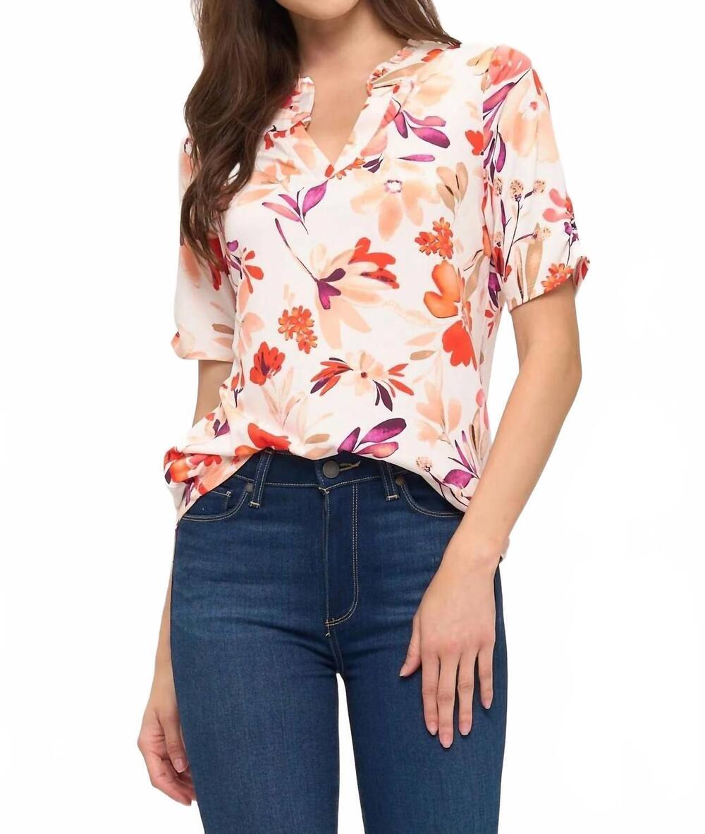 NEW PERSEPTION floral pull over shirt in ivory/ coral/ berry